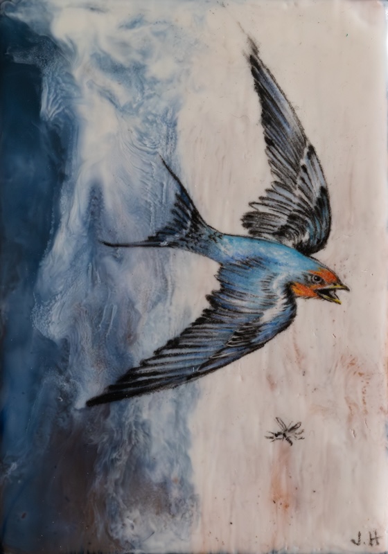 Encaustic painting of a swallow in flight