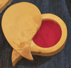 Carved wooden box with velvet lining