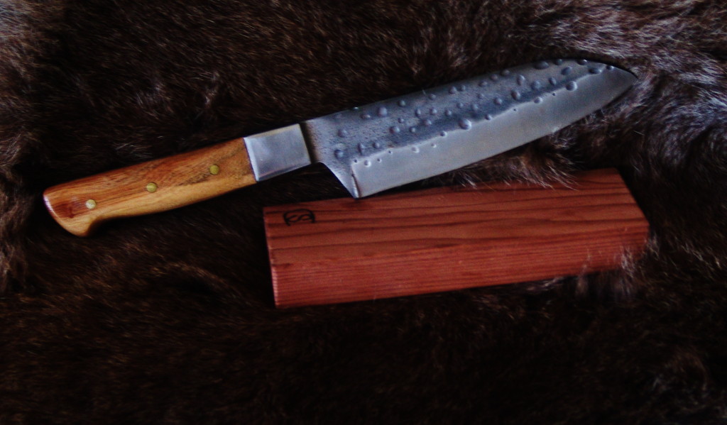 Handcrafted knife with wood handle