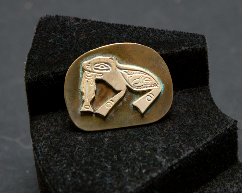 Brass Haida Sea Lion Eating Salmon